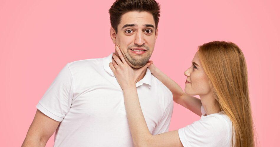 Angry woman chocking boyfriend during argument