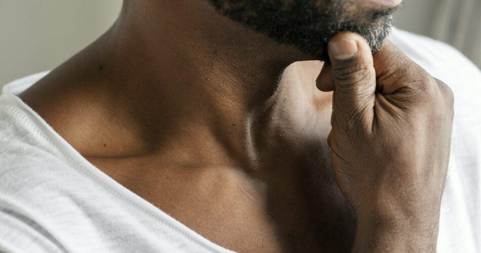 Black man thinking and contemplating concept