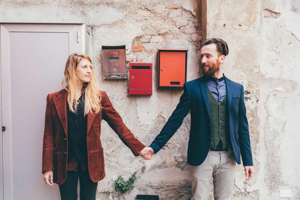 Man and woman holding hands