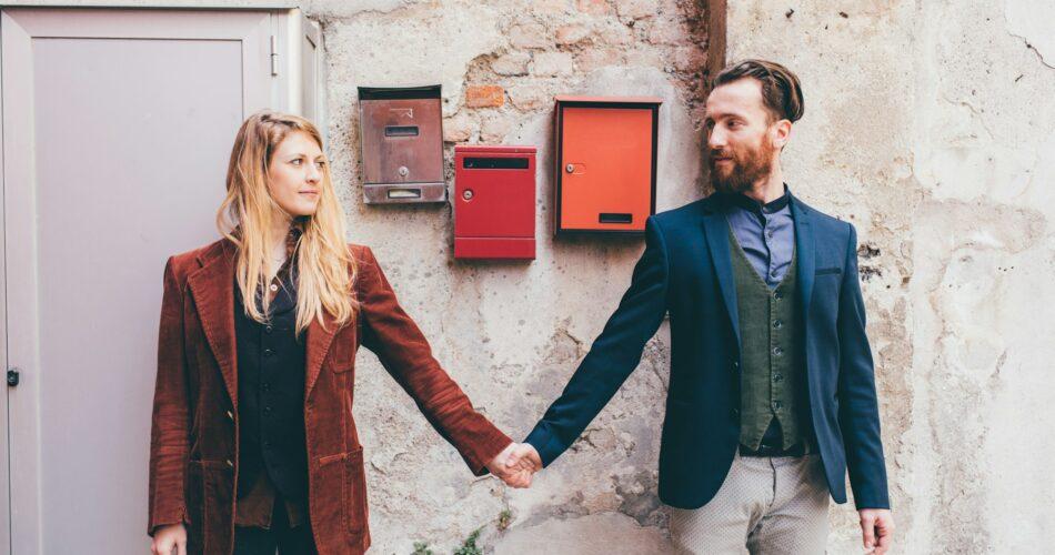 Man and woman holding hands