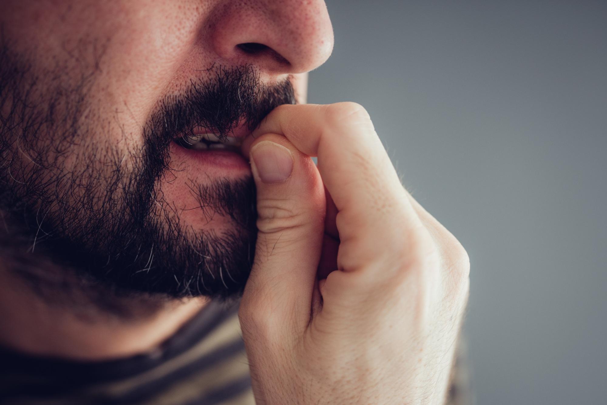 Biting fingernails