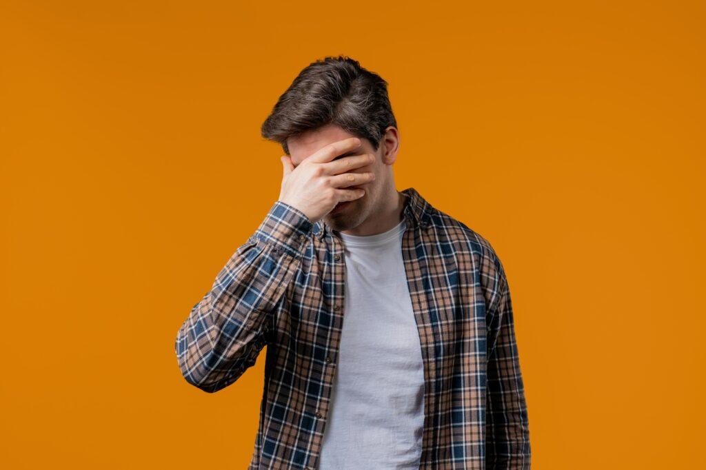 Disappointed sad man, Facepalm Gesture, Like No, I Forgot. Unhappy ashamed guy
